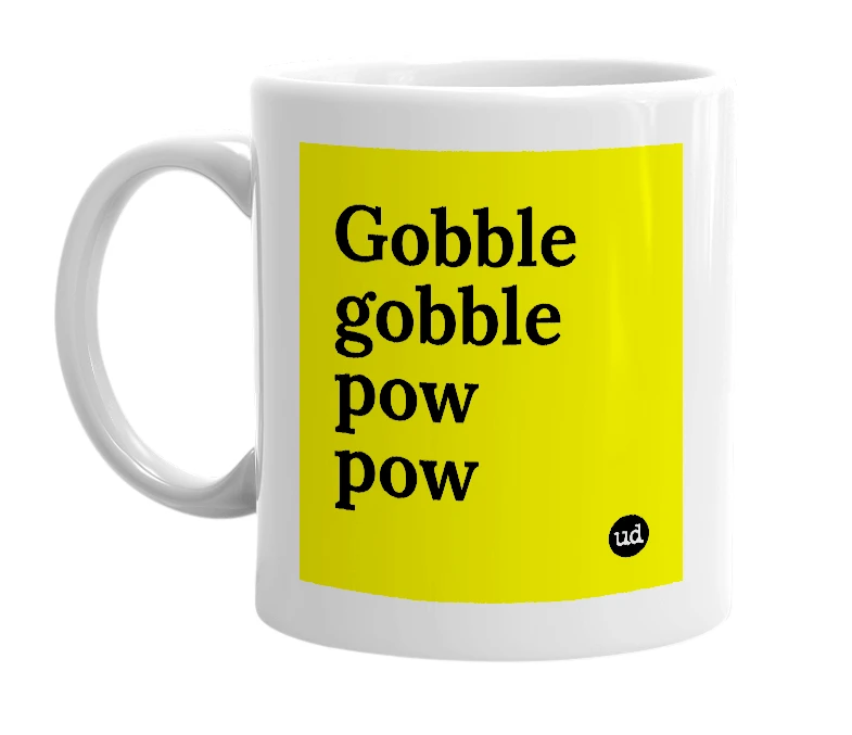 White mug with 'Gobble gobble pow pow' in bold black letters