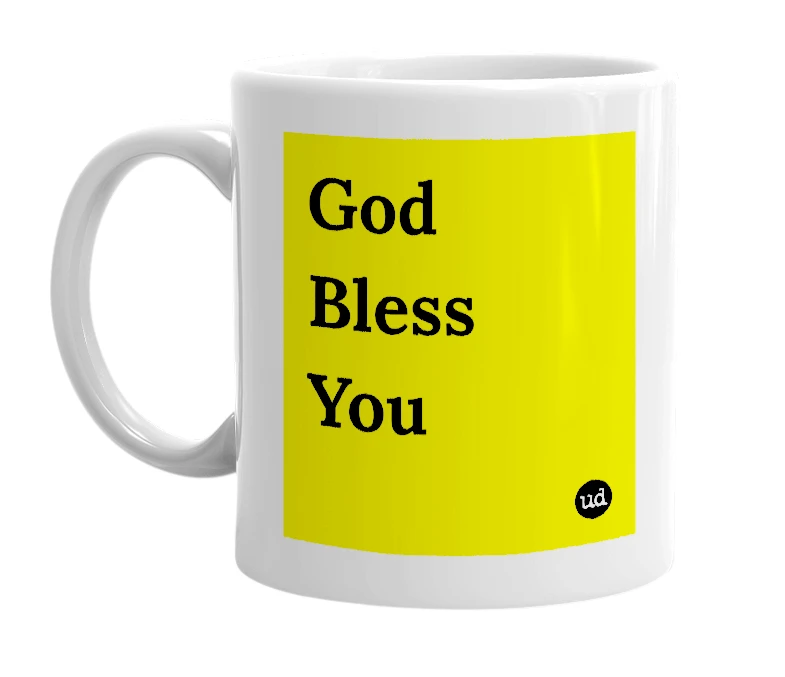 White mug with 'God Bless You' in bold black letters