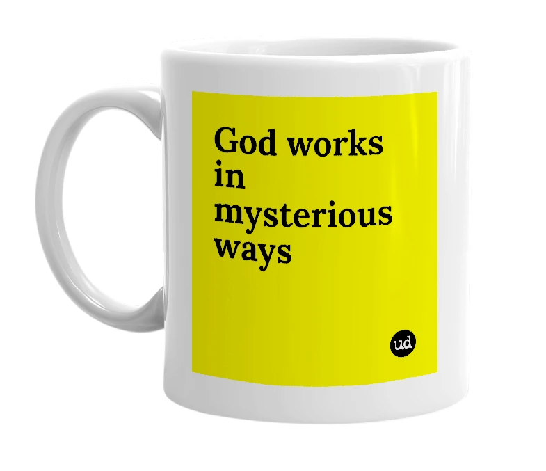 White mug with 'God works in mysterious ways' in bold black letters