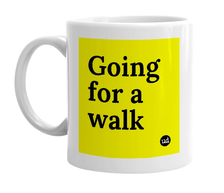 White mug with 'Going for a walk' in bold black letters