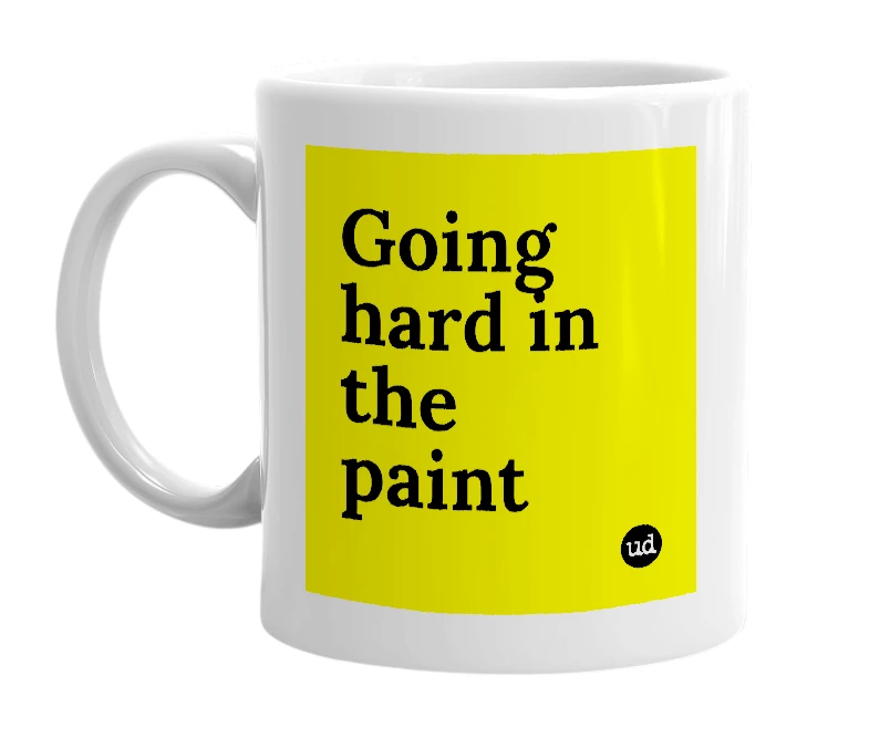 White mug with 'Going hard in the paint' in bold black letters