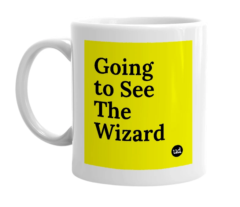 White mug with 'Going to See The Wizard' in bold black letters