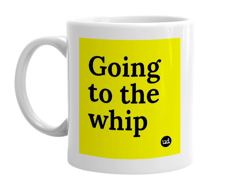 White mug with 'Going to the whip' in bold black letters