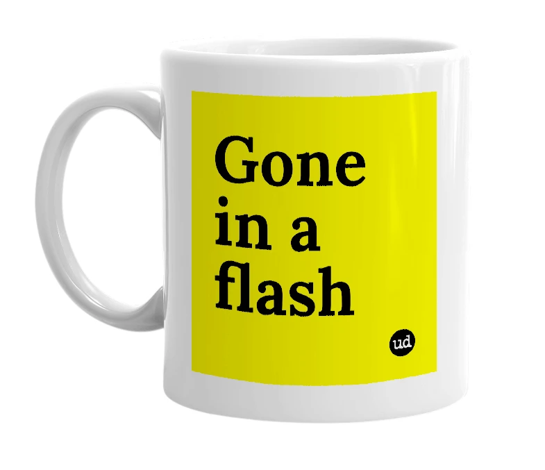 White mug with 'Gone in a flash' in bold black letters