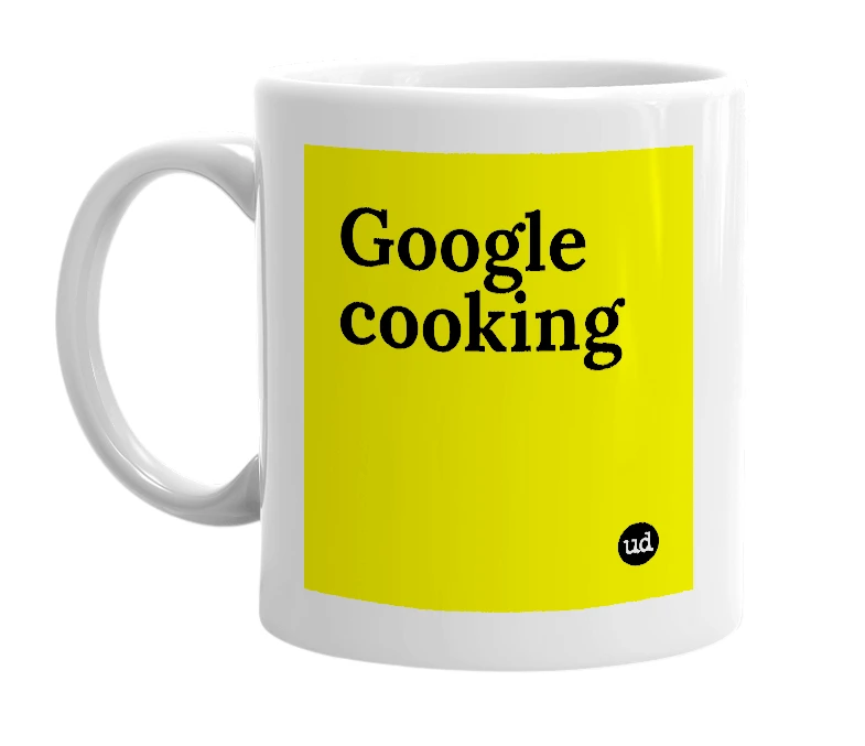 White mug with 'Google cooking' in bold black letters