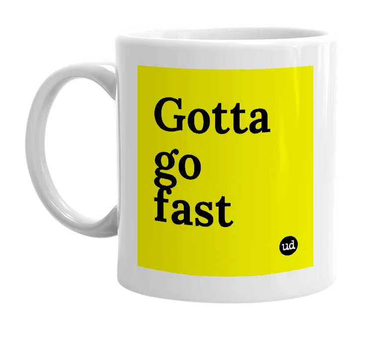 White mug with 'Gotta go fast' in bold black letters