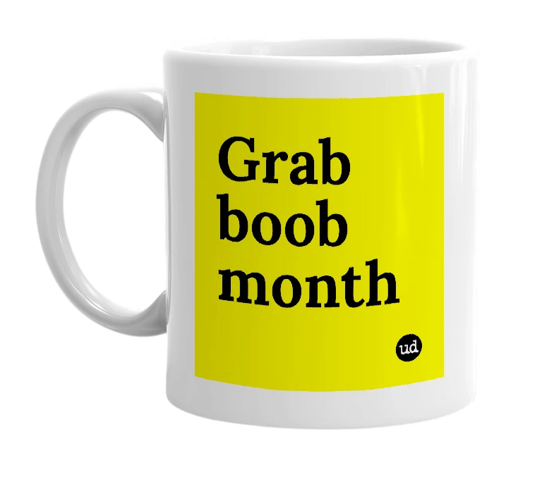 White mug with 'Grab boob month' in bold black letters