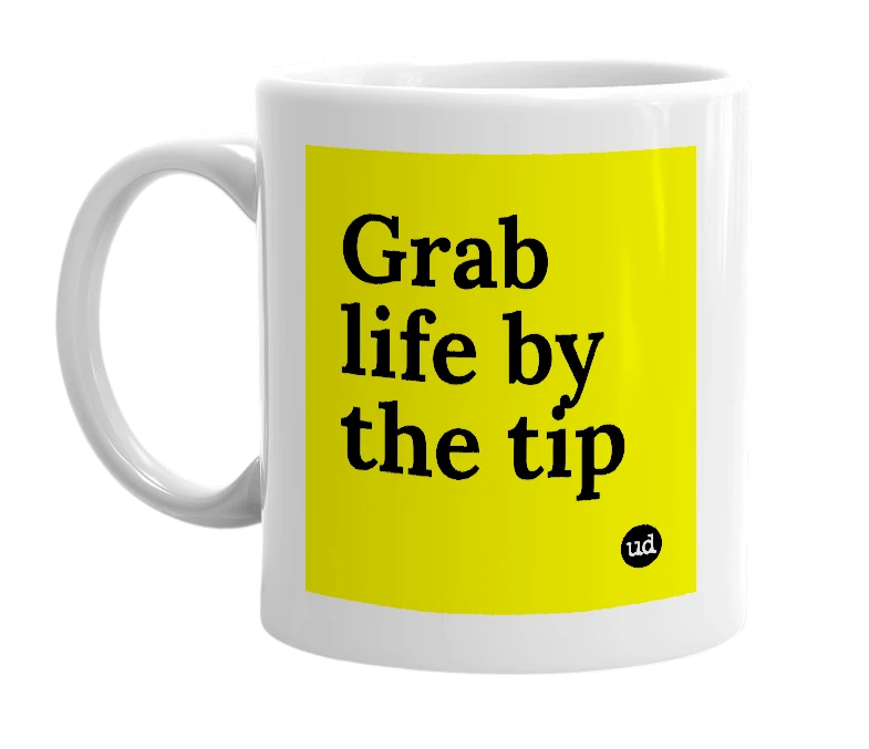White mug with 'Grab life by the tip' in bold black letters