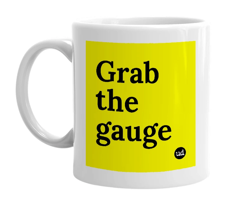 White mug with 'Grab the gauge' in bold black letters