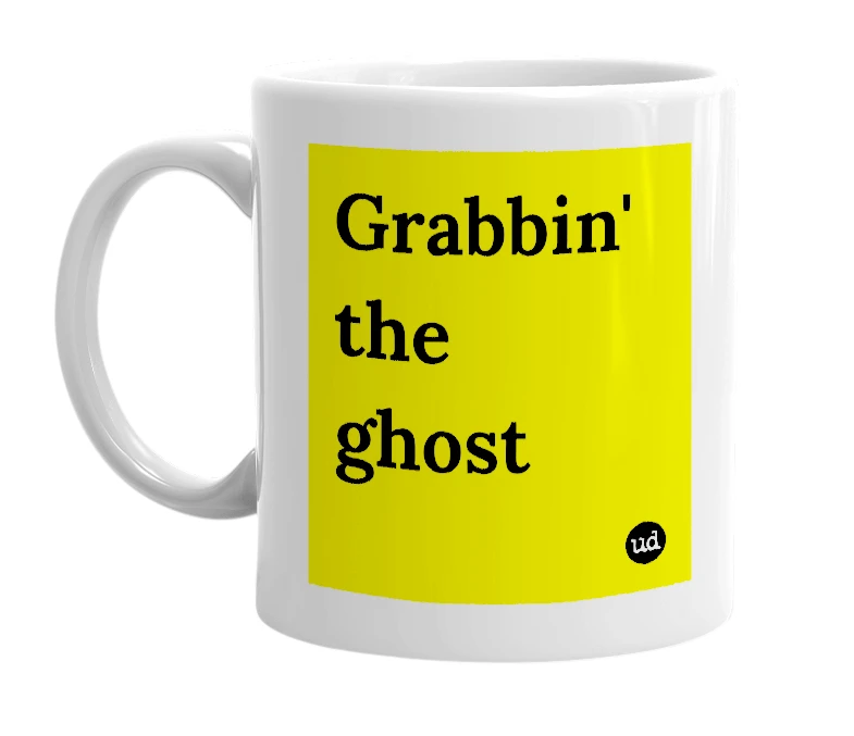 White mug with 'Grabbin' the ghost' in bold black letters