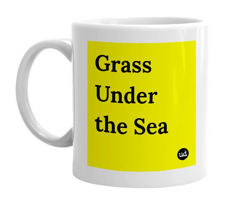 White mug with 'Grass Under the Sea' in bold black letters