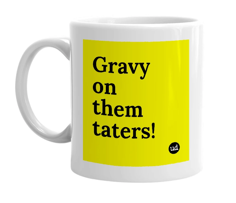 White mug with 'Gravy on them taters!' in bold black letters
