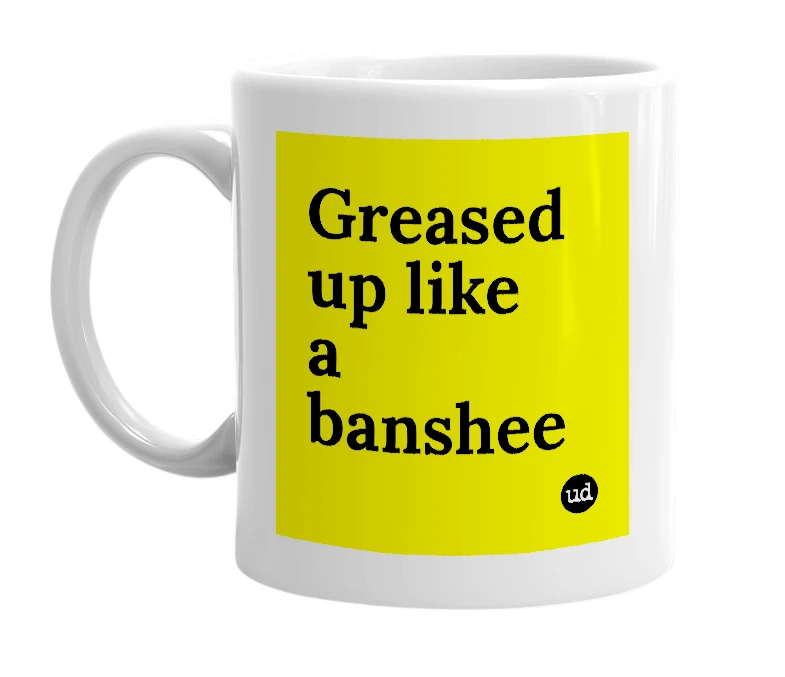 White mug with 'Greased up like a banshee' in bold black letters