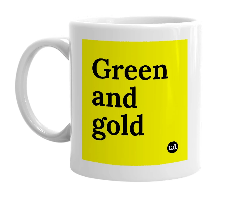 White mug with 'Green and gold' in bold black letters