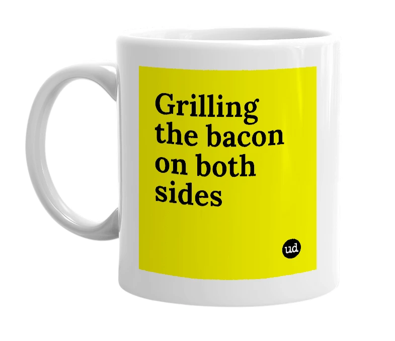 White mug with 'Grilling the bacon on both sides' in bold black letters