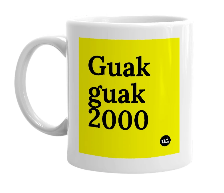 White mug with 'Guak guak 2000' in bold black letters
