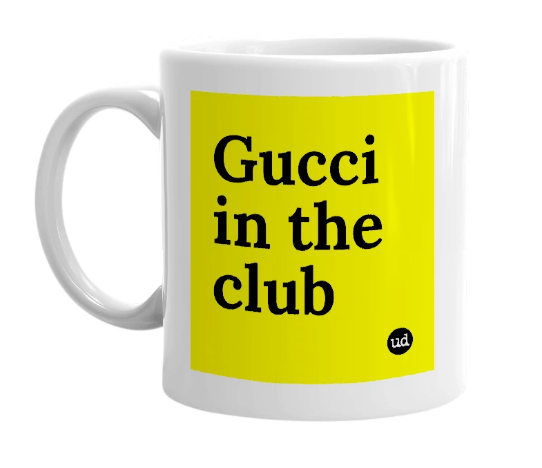 White mug with 'Gucci in the club' in bold black letters