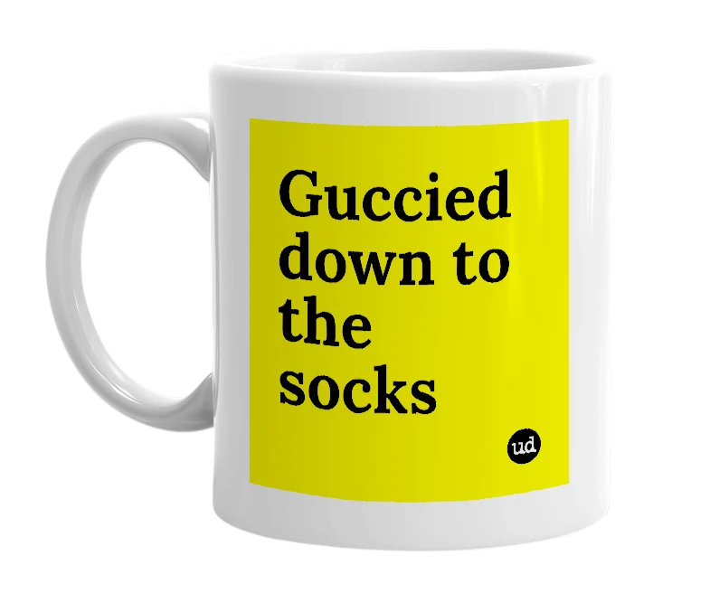White mug with 'Guccied down to the socks' in bold black letters