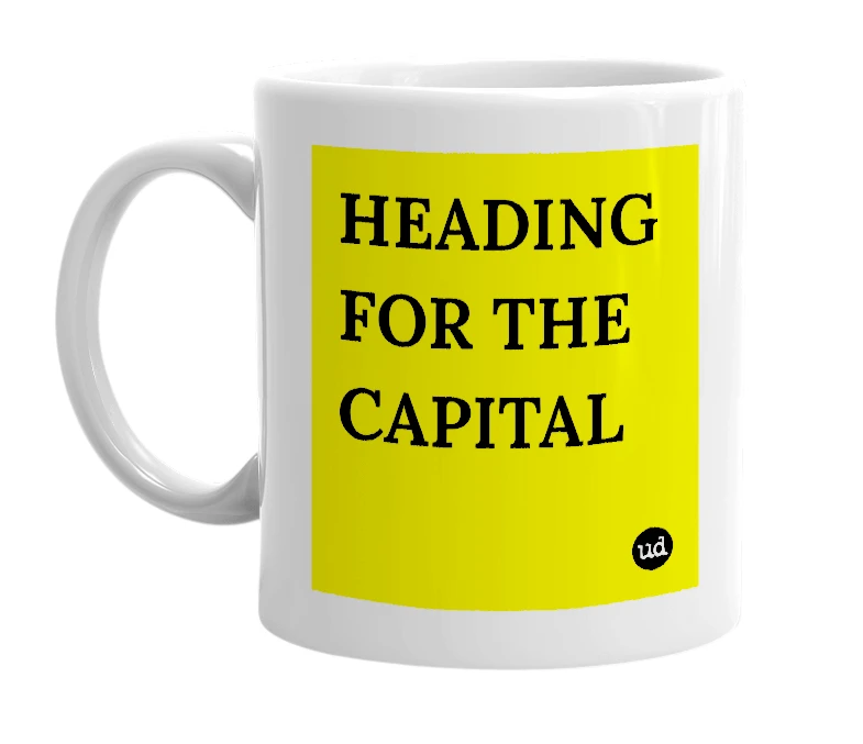 White mug with 'HEADING FOR THE CAPITAL' in bold black letters