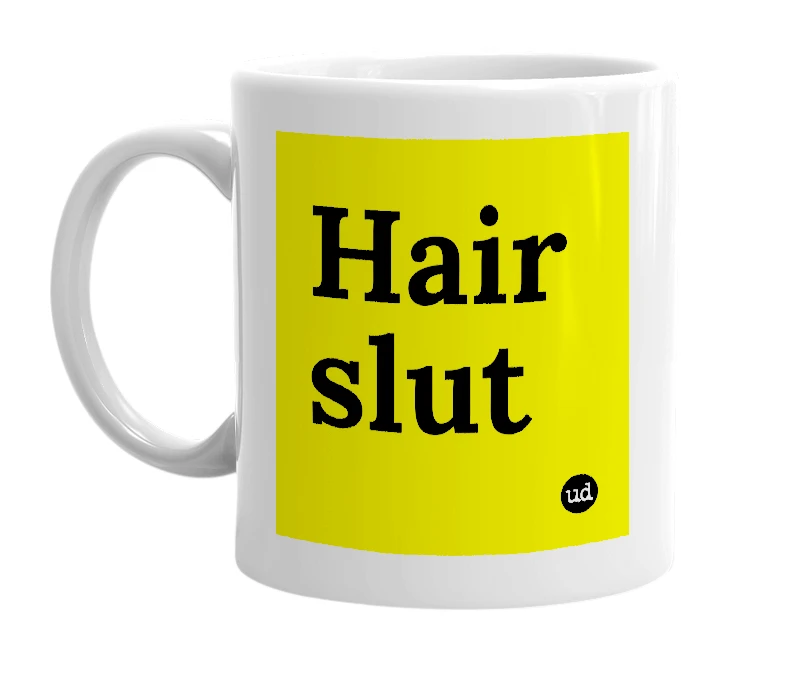 White mug with 'Hair slut' in bold black letters