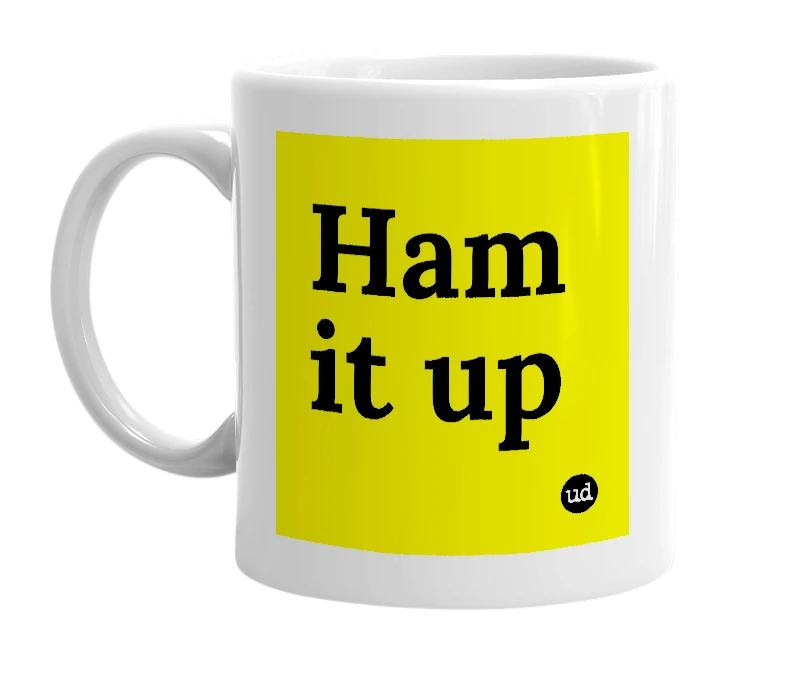 White mug with 'Ham it up' in bold black letters