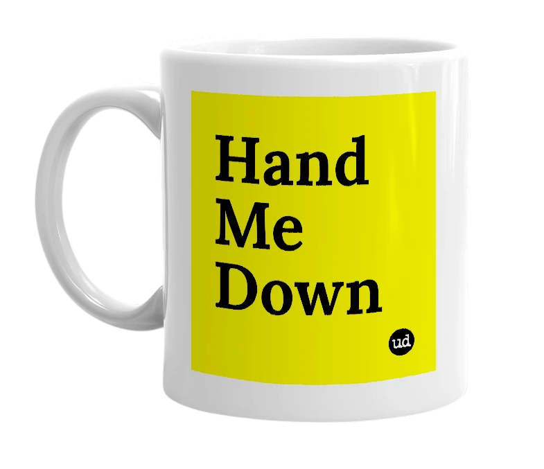 White mug with 'Hand Me Down' in bold black letters