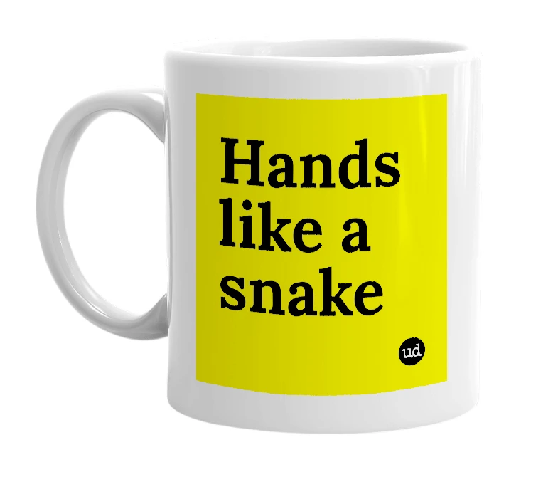 White mug with 'Hands like a snake' in bold black letters