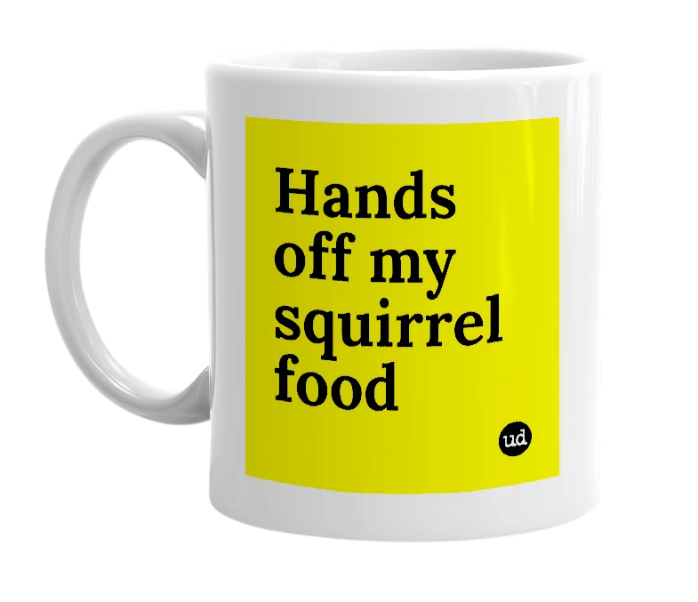 White mug with 'Hands off my squirrel food' in bold black letters