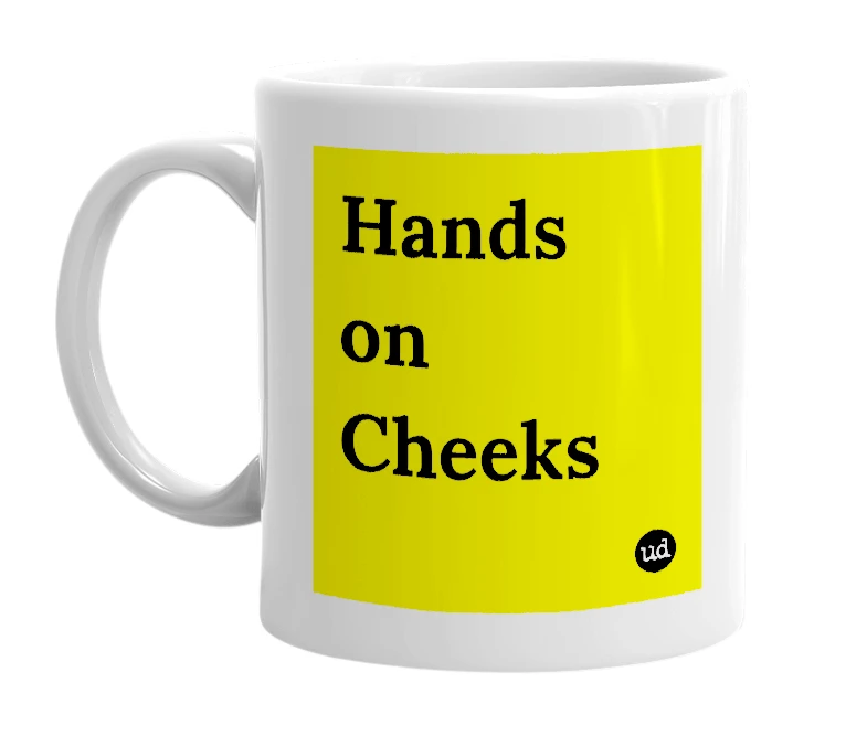 White mug with 'Hands on Cheeks' in bold black letters
