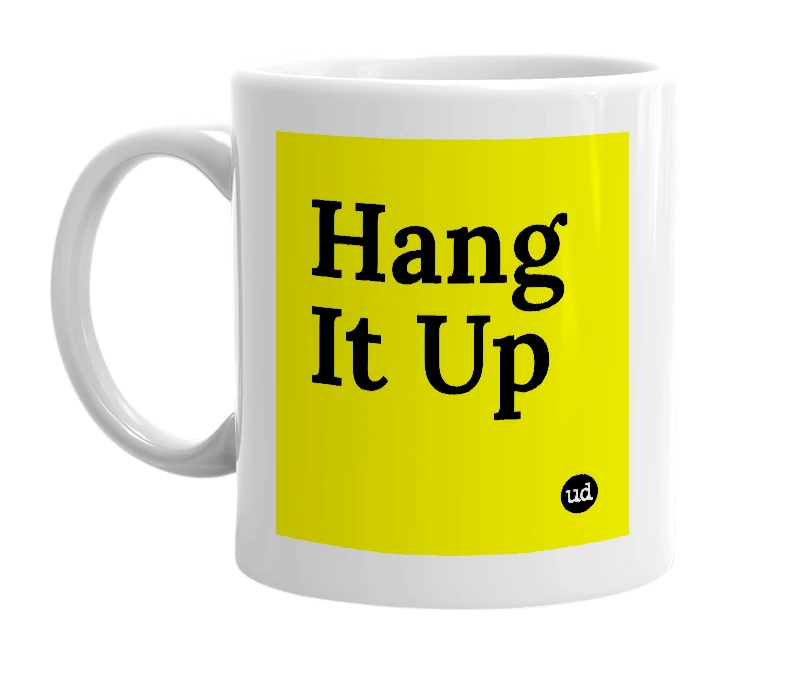 White mug with 'Hang It Up' in bold black letters