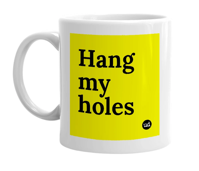 White mug with 'Hang my holes' in bold black letters