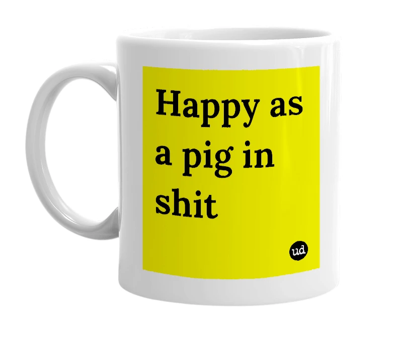White mug with 'Happy as a pig in shit' in bold black letters