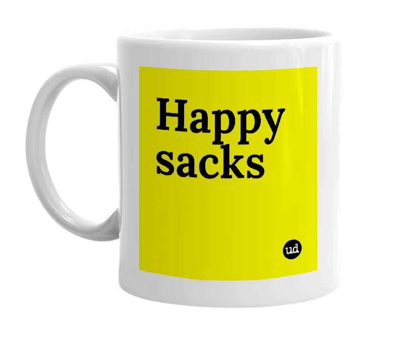 White mug with 'Happy sacks' in bold black letters
