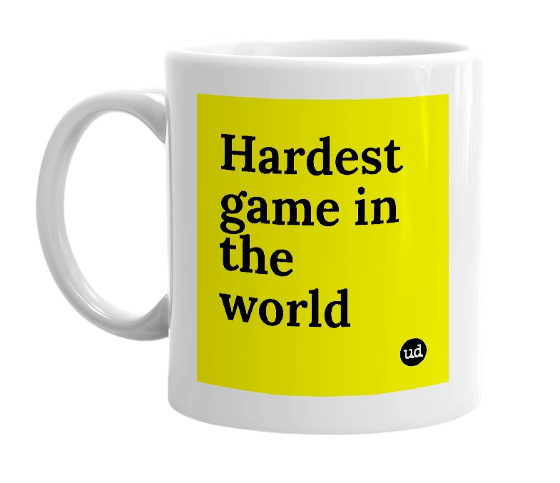 White mug with 'Hardest game in the world' in bold black letters