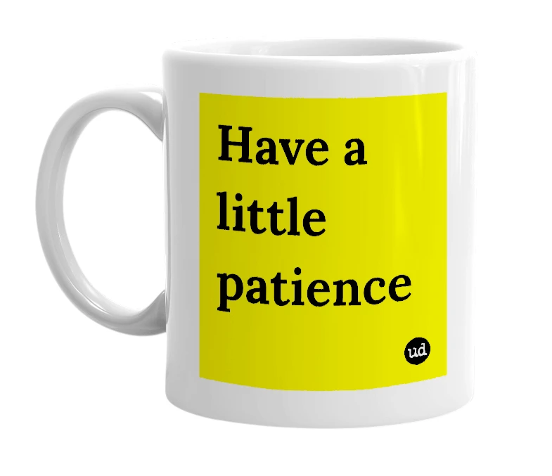 White mug with 'Have a little patience' in bold black letters