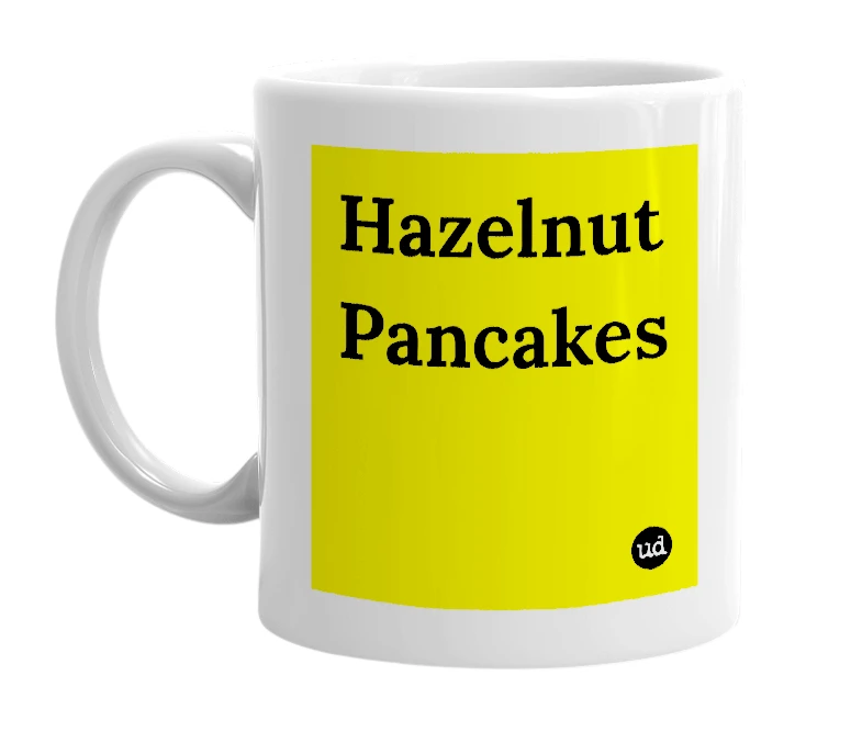 White mug with 'Hazelnut Pancakes' in bold black letters