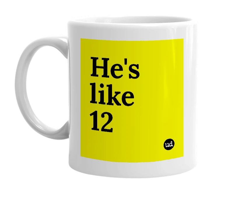 White mug with 'He's like 12' in bold black letters