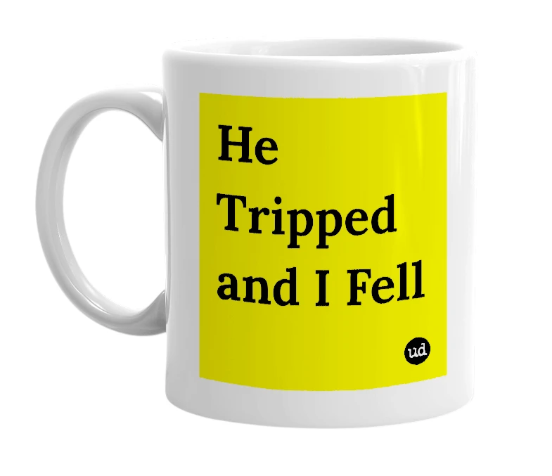White mug with 'He Tripped and I Fell' in bold black letters