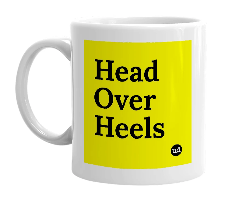 White mug with 'Head Over Heels' in bold black letters