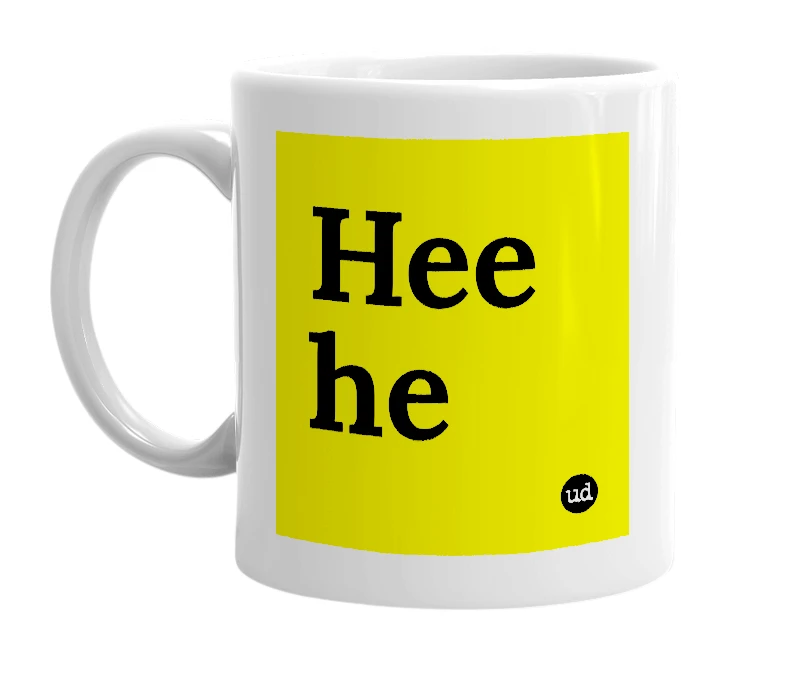 White mug with 'Hee he' in bold black letters