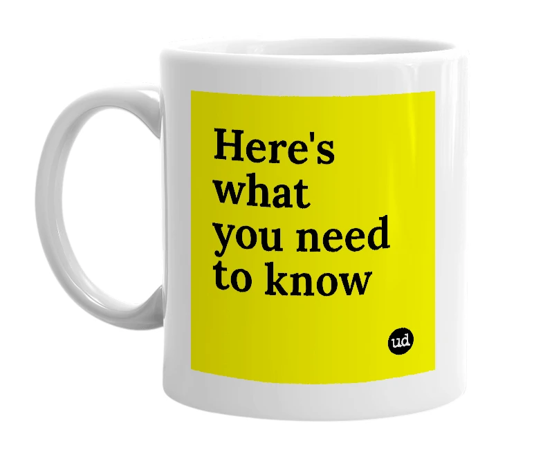 White mug with 'Here's what you need to know' in bold black letters