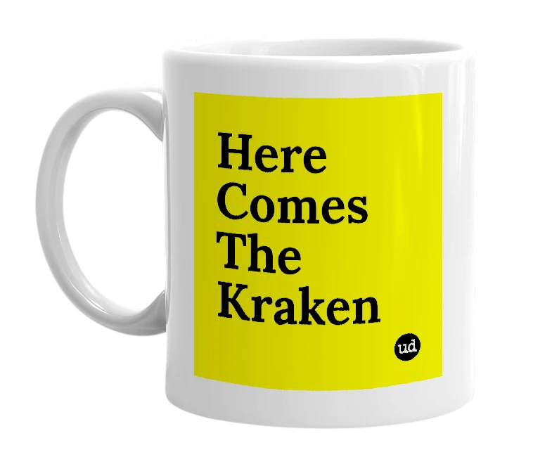 White mug with 'Here Comes The Kraken' in bold black letters