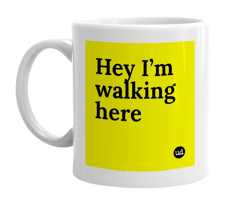 White mug with 'Hey I’m walking here' in bold black letters