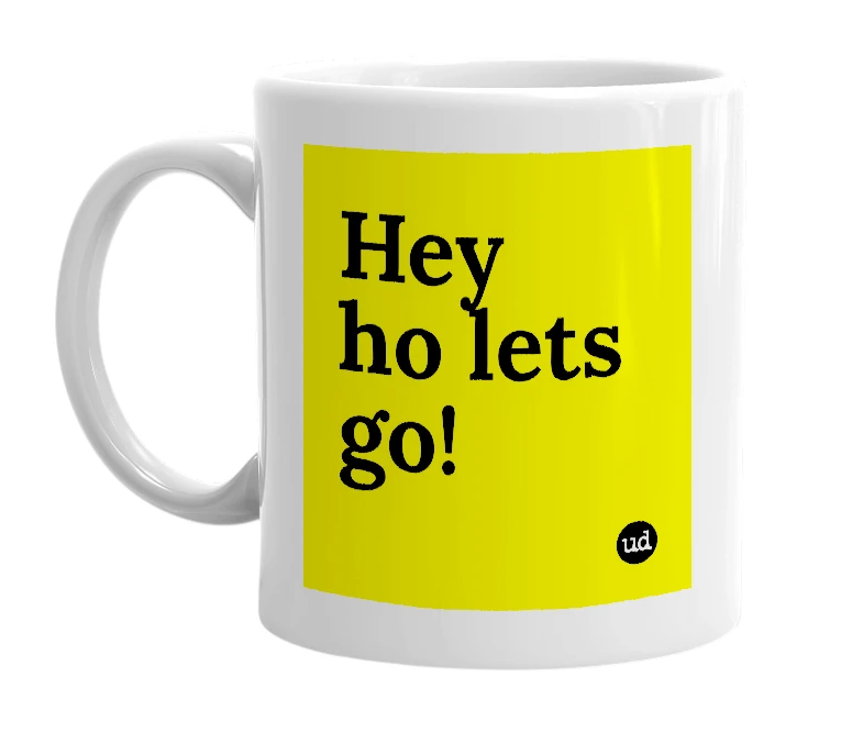 White mug with 'Hey ho lets go!' in bold black letters