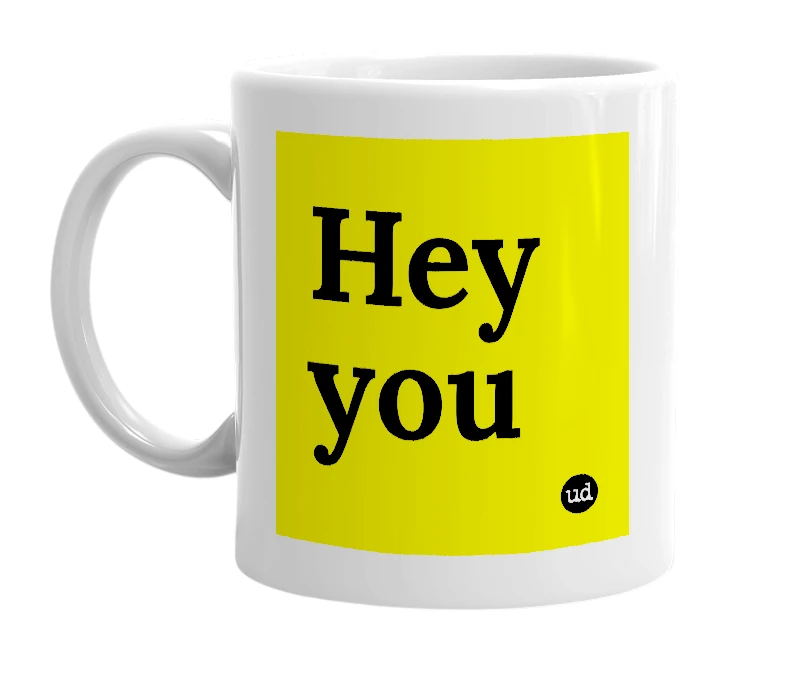 White mug with 'Hey you' in bold black letters