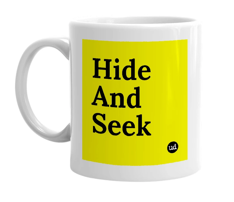 White mug with 'Hide And Seek' in bold black letters