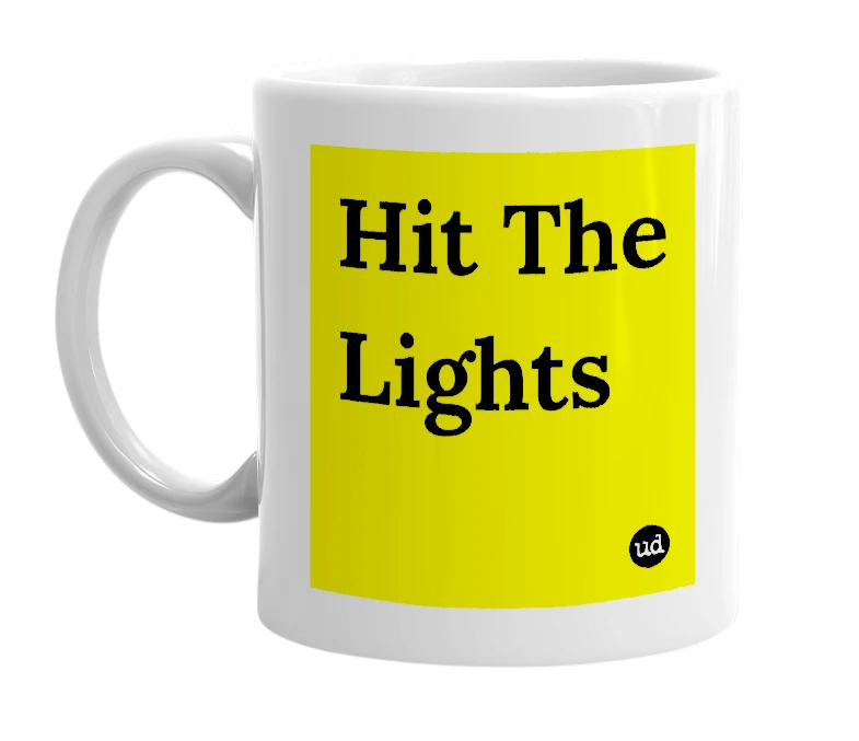 White mug with 'Hit The Lights' in bold black letters
