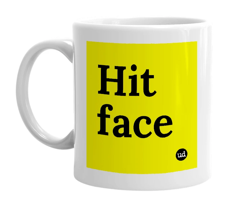 White mug with 'Hit face' in bold black letters