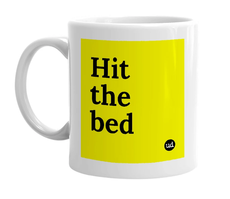 White mug with 'Hit the bed' in bold black letters