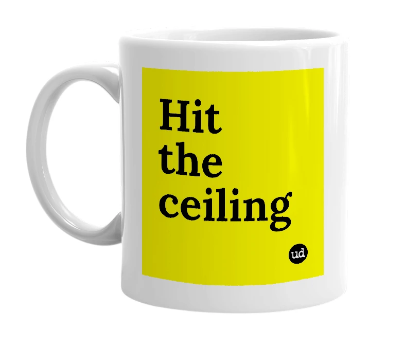 White mug with 'Hit the ceiling' in bold black letters